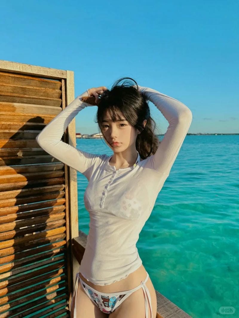 gái cấp 2 mặc bikini 9